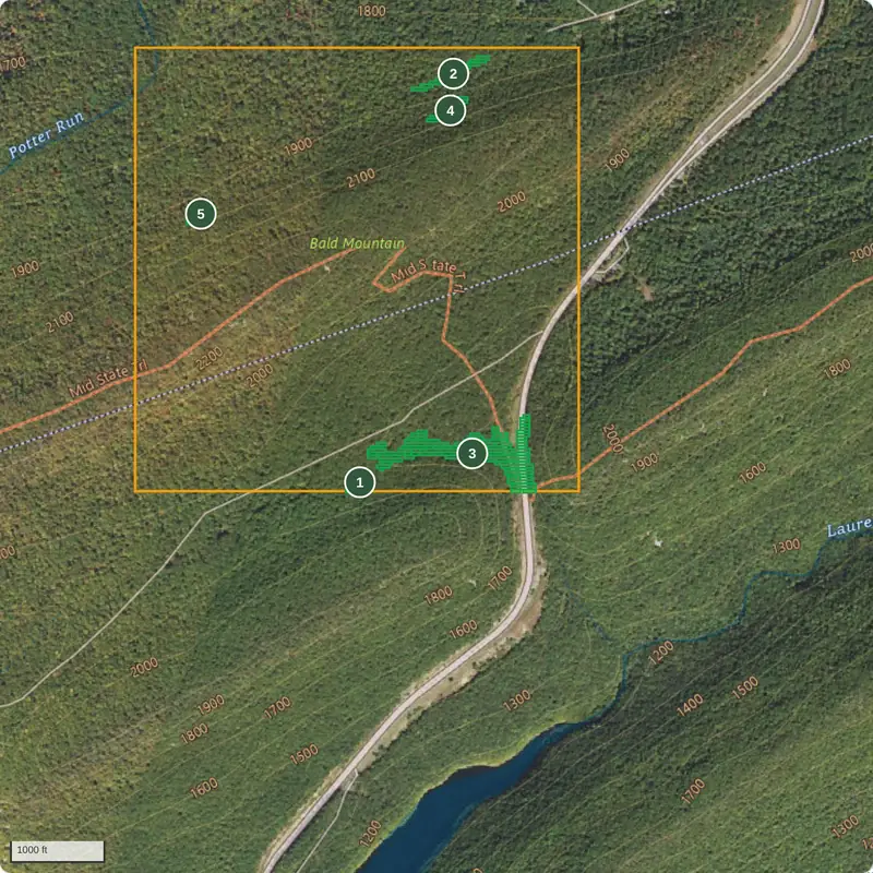 USGS aerial imagery with topographic contours of a 500-acre square on a Seven Mountains ridge in central Pennsylvania, with five numbered mapped terrain features from the cached example analysis: two benches on the north slope, one near the west edge, and two draws along the south edge near US 322.
